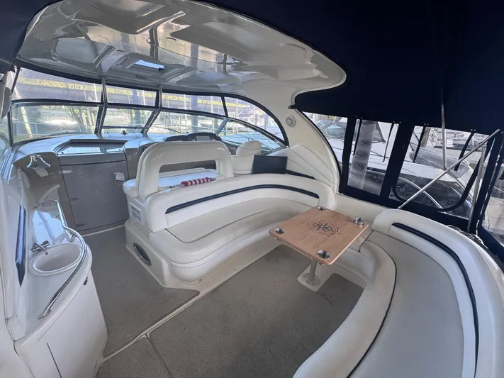 Skeeter Yacht Photos Pics Luxurious interior of 2004 Sea Ray 420 Sundancer yacht with spacious seating and elegant design.
