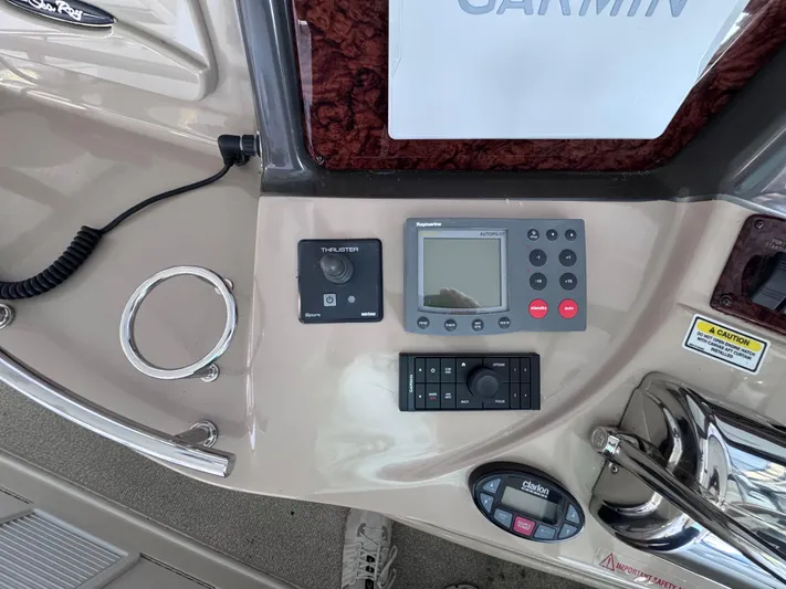 Skeeter Yacht Photos Pics Control panel of a 2004 Sea Ray 420 Sundancer with Garmin and Panasonic equipment.