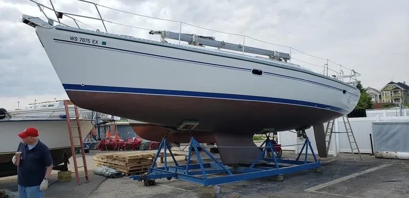Sail N By Yacht Photos Pics 2001 Catalina 400 MkII sailboat on a stand, with a person nearby.