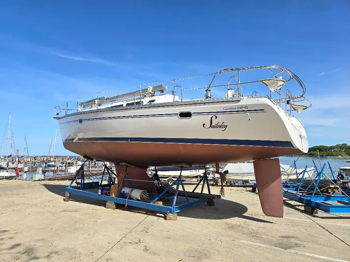Sail N By Yacht Photos Pics Catalina 400 MkII 2001 sailboat on dry dock under clear blue sky.