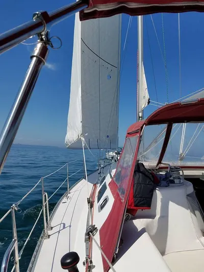 Sail N By Yacht Photos Pics Sailing on a 2001 Catalina 400 MkII yacht with clear blue skies and calm waters.