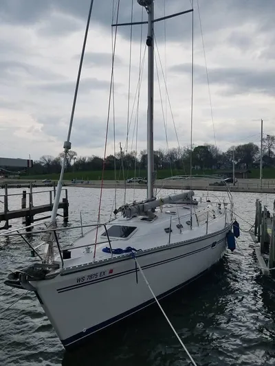 Sail N By Yacht Photos Pics 2001 Catalina 400 MkII sailboat docked on a cloudy day.