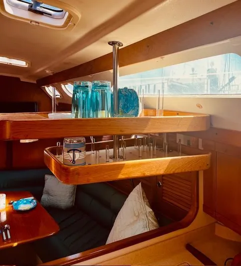 Sail N By Yacht Photos Pics Interior of 2001 Catalina 400 MkII yacht with wooden shelves and seating area.