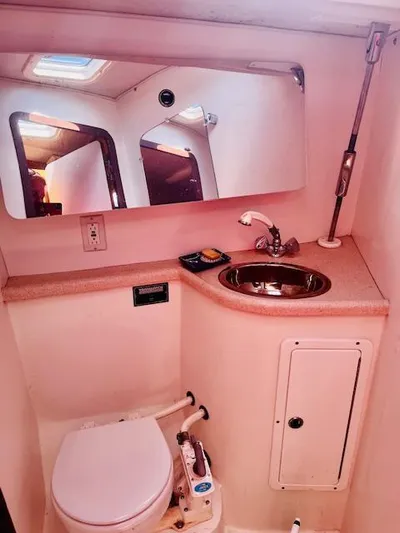 Sail N By Yacht Photos Pics Bathroom interior of a 2001 Catalina 400 MkII sailboat with sink and toilet.
