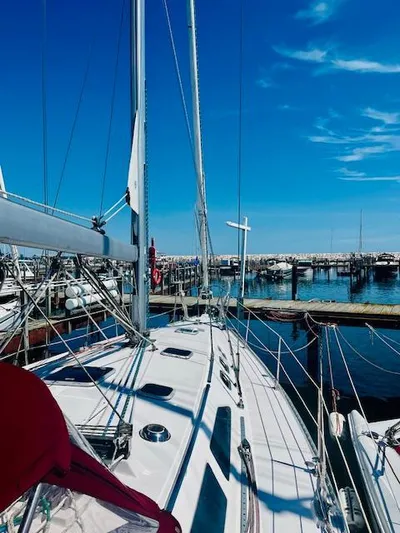 Sail N By Yacht Photos Pics Sailboat Catalina 400 MkII, 2001 model, docked at marina under clear blue sky.