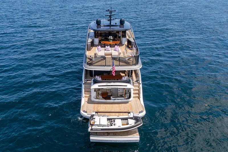  Yacht Photos Pics Luxury 2022 Princess X95 yacht on open sea, showcasing elegant multi-deck design.