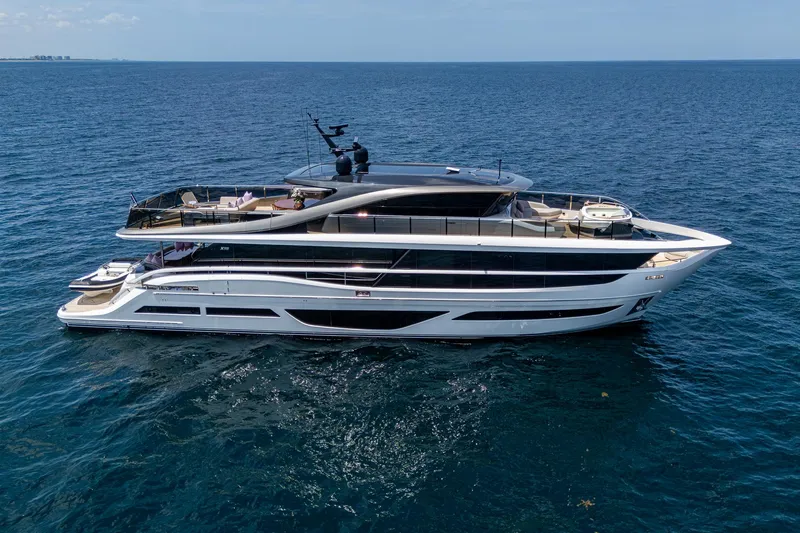  Yacht Photos Pics Luxurious 2022 Princess X95 yacht cruising on open sea, showcasing sleek design and elegance.