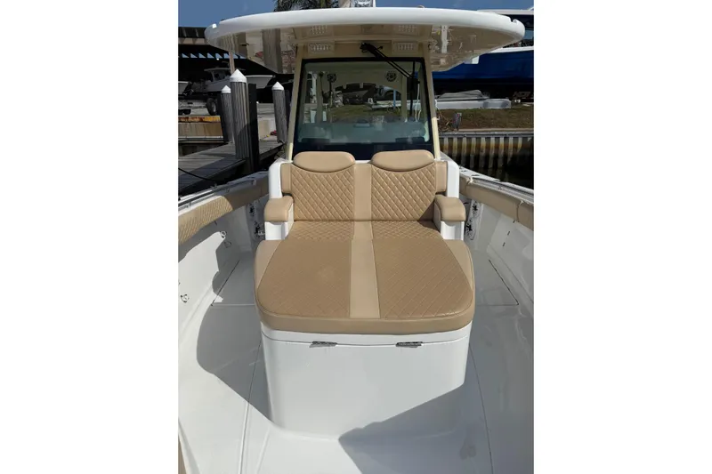 Sprinkles Yacht Photos Pics 2024 HCB 39 Speciale boat with tan cushioned seating and sleek design.