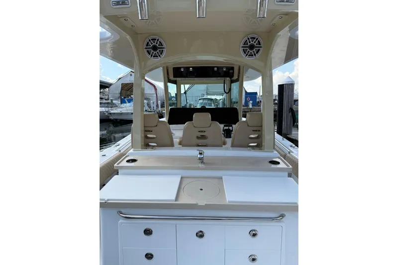 Sprinkles Yacht Photos Pics 2024 HCB 39 Speciale boat interior with seating and storage compartments.