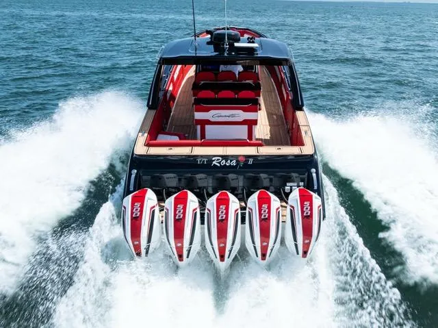  Yacht Photos Pics 2025 Cigarette 42 Auroris speedboat with multiple engines cruising on open water.