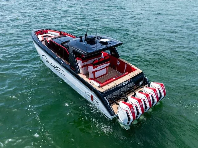  Yacht Photos Pics 2025 Cigarette 42 Auroris boat with multiple engines cruising on open water.