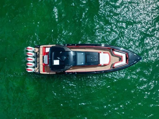  Yacht Photos Pics Aerial view of 2025 Cigarette 42 Auroris boat on green water.