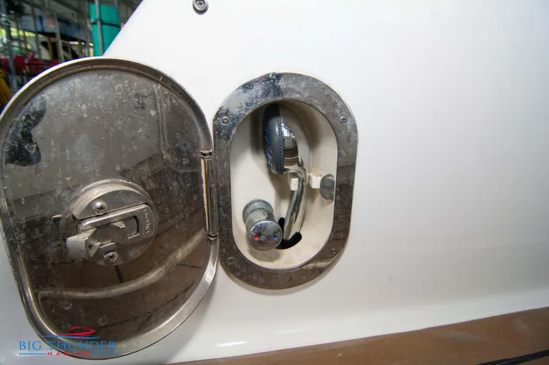  Yacht Photos Pics Fuel cap compartment of a 2010 Sea Ray 470 Sundancer boat.