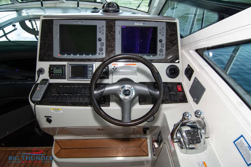  Yacht Photos Pics Helm of 2010 Sea Ray 470 Sundancer with advanced navigation systems.
