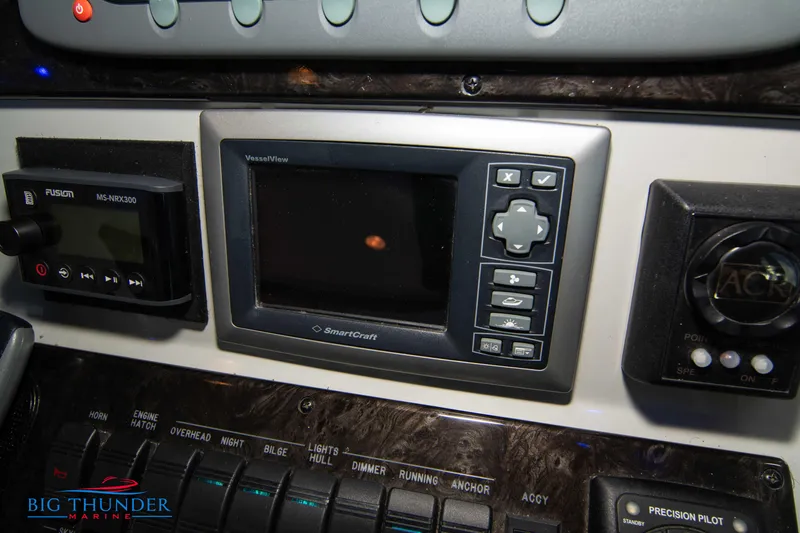  Yacht Photos Pics Control panel of a 2010 Sea Ray 470 Sundancer boat with navigation and monitoring systems.