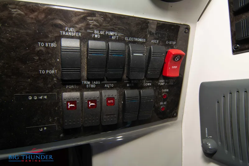  Yacht Photos Pics Control panel of a 2010 Sea Ray 470 Sundancer boat with various switches and labels.