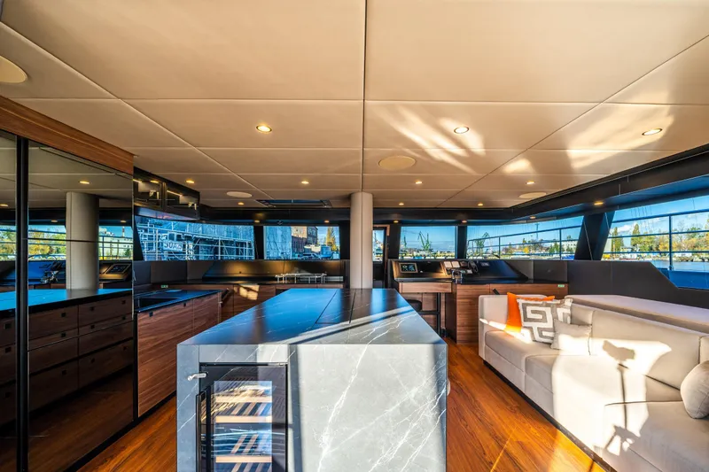 Surf Soul Yacht Photos Pics Luxurious interior of 2023 Sunreef 50 yacht with modern design and panoramic windows.