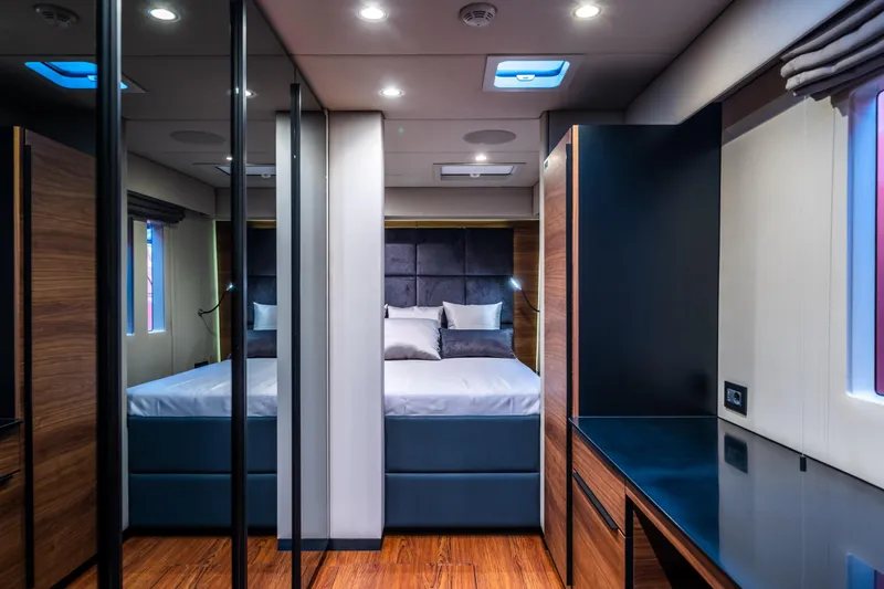 Surf Soul Yacht Photos Pics Luxurious interior of 2023 Sunreef 50 yacht with modern bedroom design.