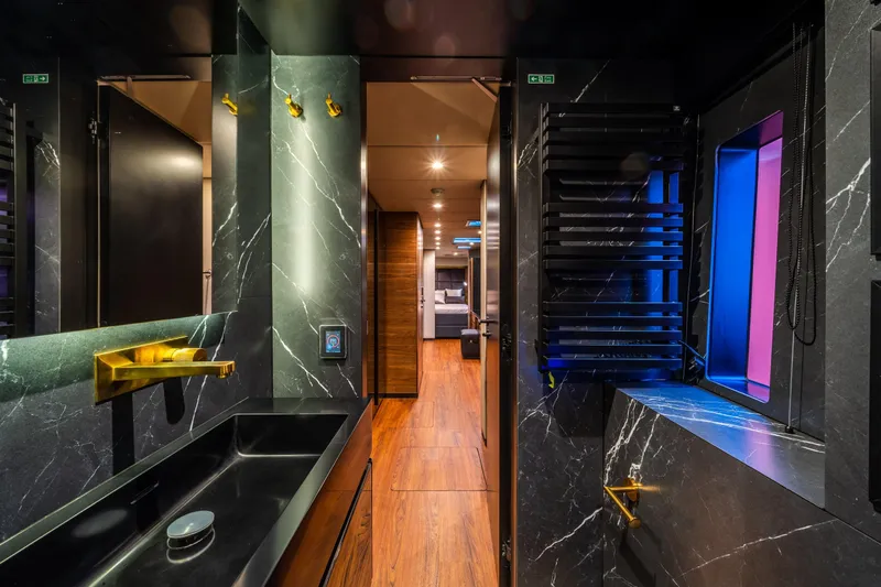 Surf Soul Yacht Photos Pics Luxurious bathroom interior of 2023 Sunreef 50 yacht with modern design and elegant fixtures.