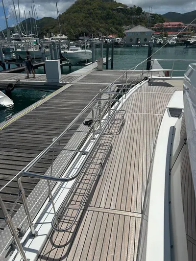 Voyager Yacht Photos Pics Bali 5.4 yacht docked at marina, showcasing sleek deck design, 2023 model.