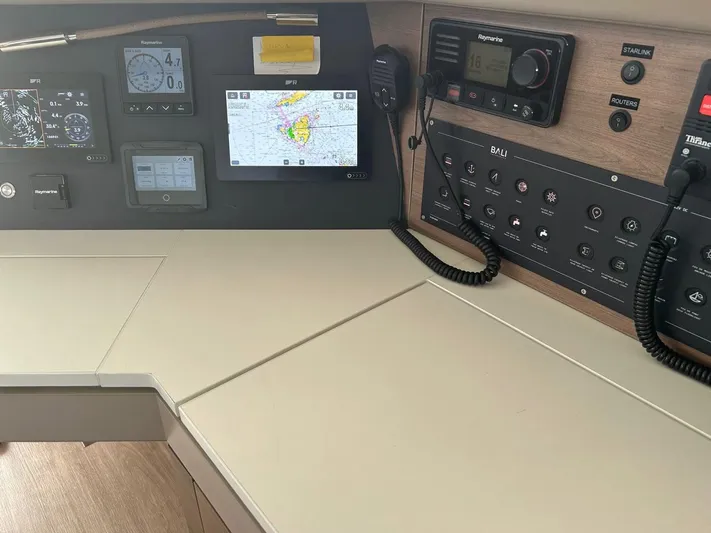 Voyager Yacht Photos Pics Control panel of a 2023 Bali 5.4 yacht with navigation and communication systems.