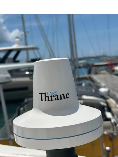 Voyager Yacht Photos Pics Lars Thrane marine equipment on a Bali 5.4 yacht, 2023 model, docked at a marina.