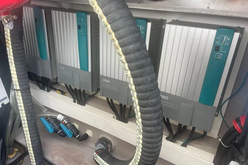 Voyager Yacht Photos Pics Electrical components in a 2023 Bali 5.4 model, featuring multiple power inverters.