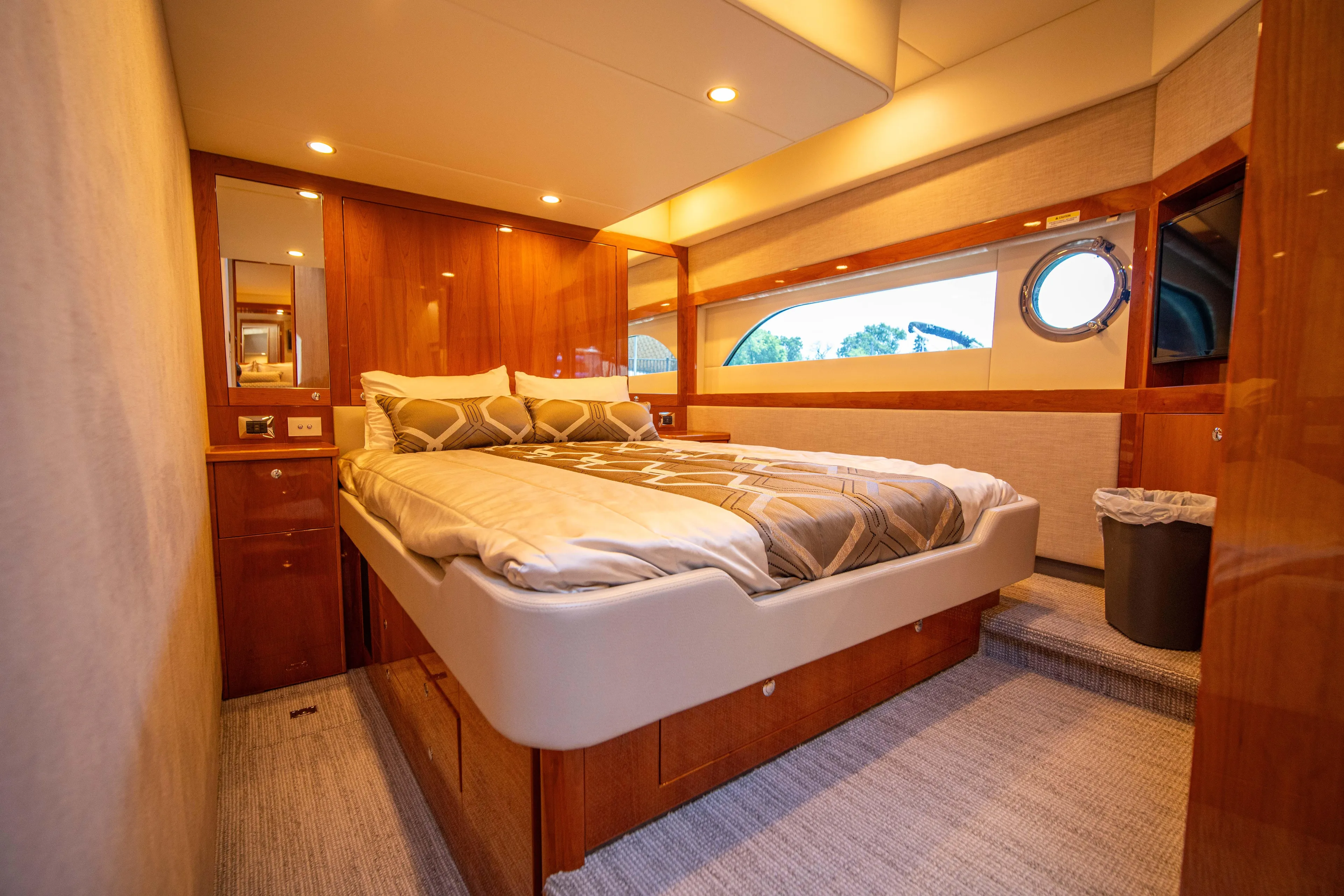  Yacht Photos Pics Luxurious bedroom interior of 2020 Riviera 525 SUV yacht.