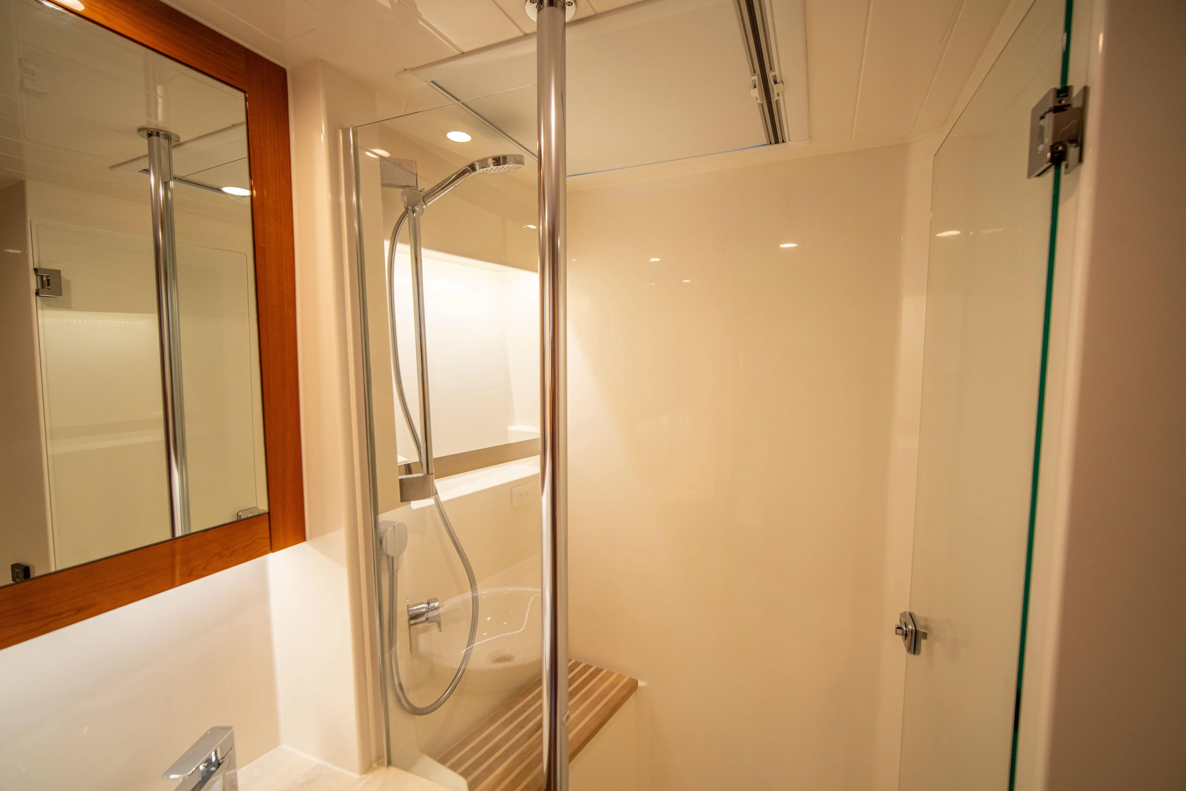  Yacht Photos Pics Luxurious bathroom in 2020 Riviera 525 SUV yacht with modern shower design.