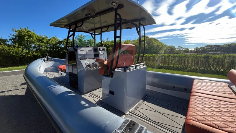  Yacht Photos Pics 2023 Fluid Watercraft M35 boat with modern design and spacious seating.