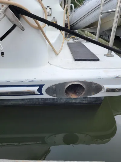 All In Yacht Photos Pics 2003 Lion Robertson & Caine Lion 46 yacht stern in marina.