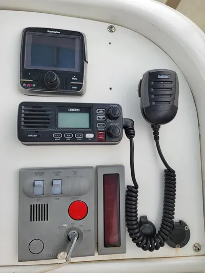 All In Yacht Photos Pics Boat control panel with radio and navigation equipment on a 2003 Robertson & Caine Lion 46.