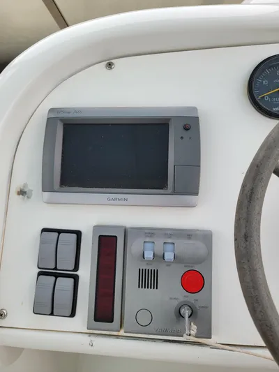 All In Yacht Photos Pics Boat control panel with Garmin display on 2003 Robertson & Caine Lion 46.