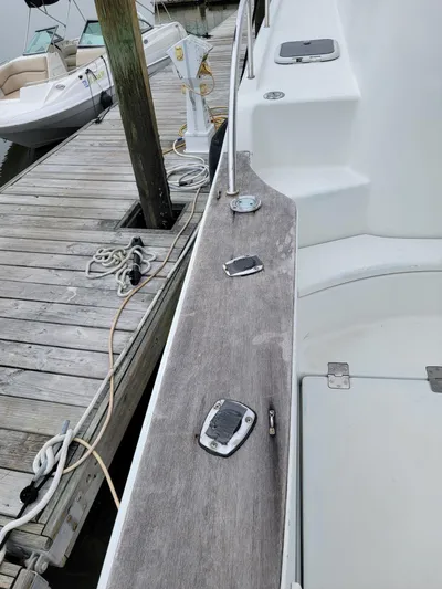 All In Yacht Photos Pics 2003 Lion Robertson & Caine Lion 46 yacht docked at marina.