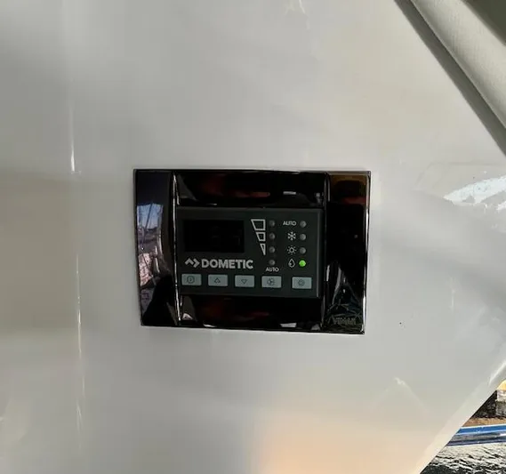 Sea Of Dreams Yacht Photos Pics Dometic control panel on 2024 Beneteau Antares 9 boat interior.