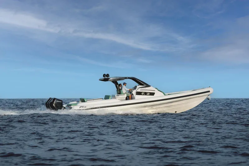  Yacht Photos Pics 2025 Panamera Yacht PY 110 Veloce cruising on open sea under clear blue sky.