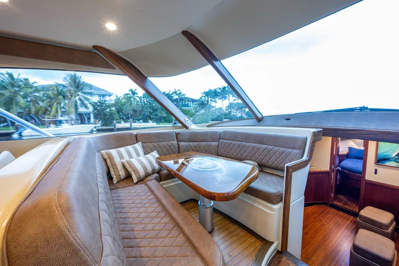 Flying B Yacht Photos Pics Luxurious interior of 2018 French Yachts Custom Express Sportfish with plush seating and elegant design.