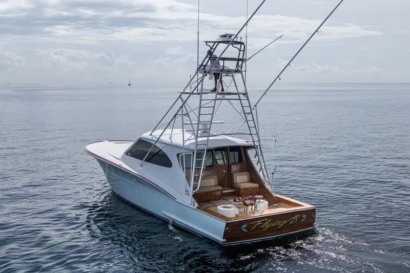Flying B Yacht Photos Pics 2018 French Yachts Custom Express Sportfish on calm ocean waters.