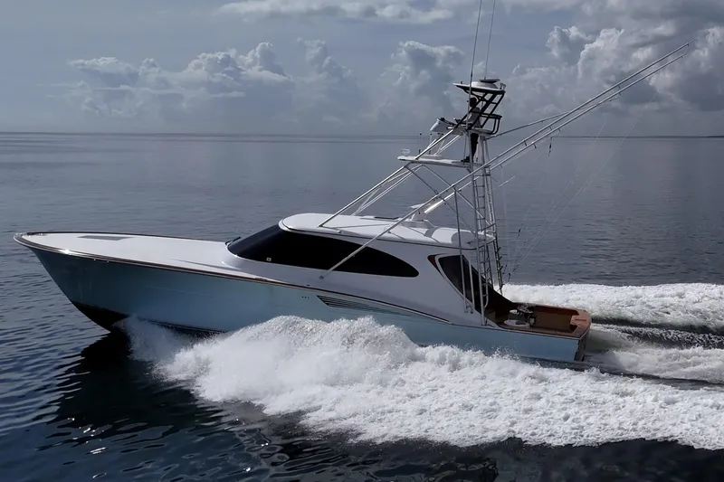 Flying B Yacht Photos Pics 2018 French Yachts Custom Express Sportfish cruising on calm ocean waters.