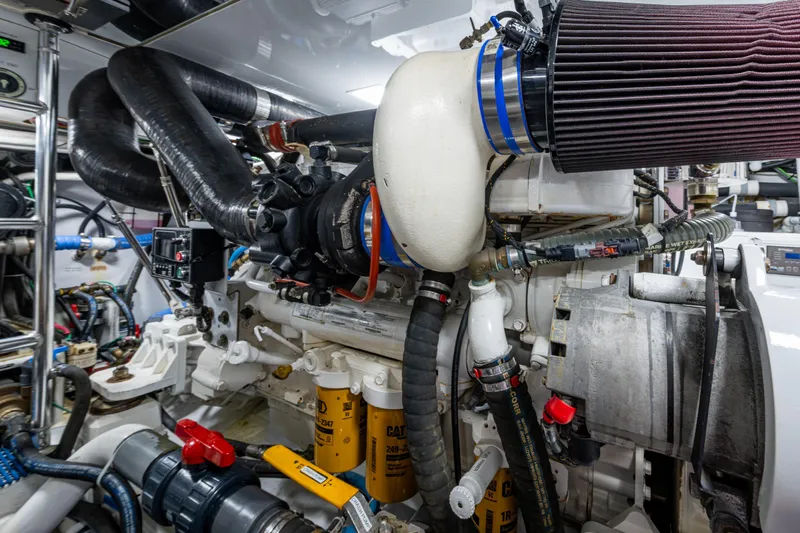 Flying B Yacht Photos Pics Engine room of 2018 French Yachts Custom Express Sportfish, showcasing complex machinery and components.