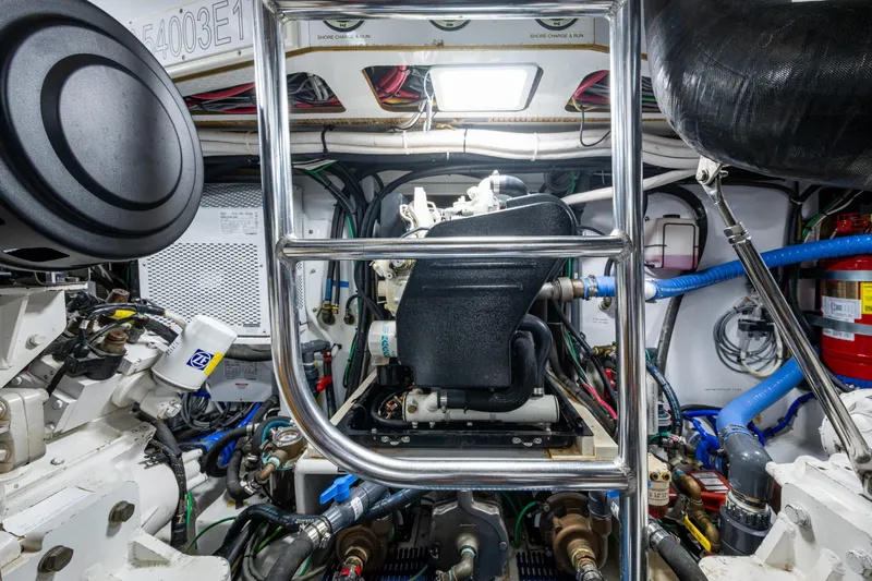 Flying B Yacht Photos Pics Engine room of 2018 French Yachts Custom Express Sportfish, showcasing mechanical components and wiring.