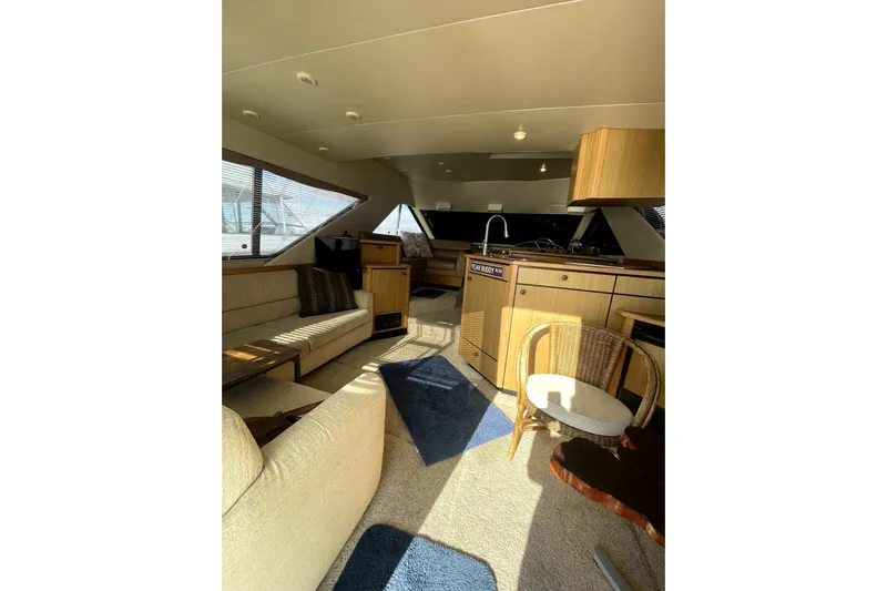 Yeah Buddy Yacht Photos Pics Interior of 2001 Bayliner 3988 Command Bridge Motoryacht with cozy seating and modern amenities.