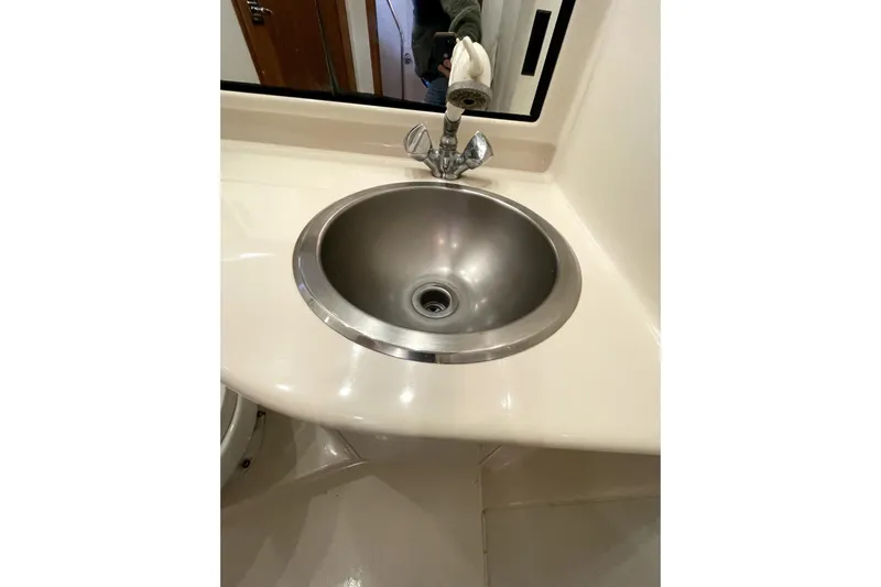 Yeah Buddy Yacht Photos Pics Stainless steel sink in 2001 Bayliner 3988 Command Bridge Motoryacht bathroom.