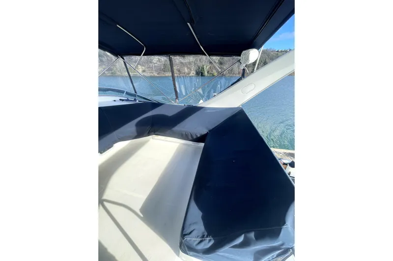 Yeah Buddy Yacht Photos Pics 2001 Bayliner 3988 Command Bridge Motoryacht interior with blue seating and water view.