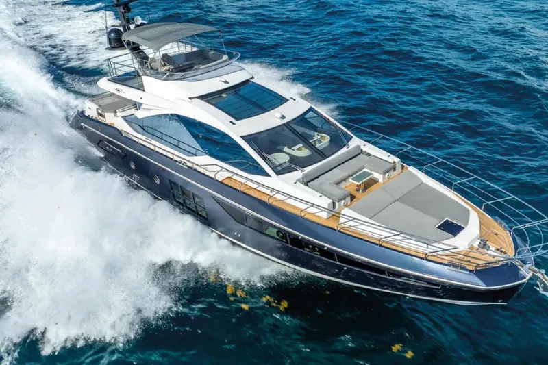 No Name Yacht Photos Pics Luxurious 2019 Azimut S7 yacht cruising on open sea, showcasing sleek design and elegance.