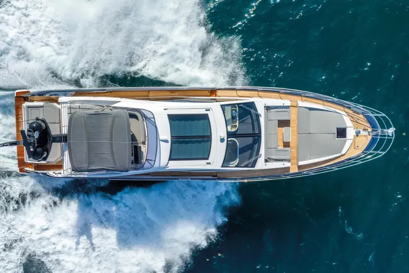 No Name Yacht Photos Pics Aerial view of 2019 Azimut S7 yacht cruising on open water.