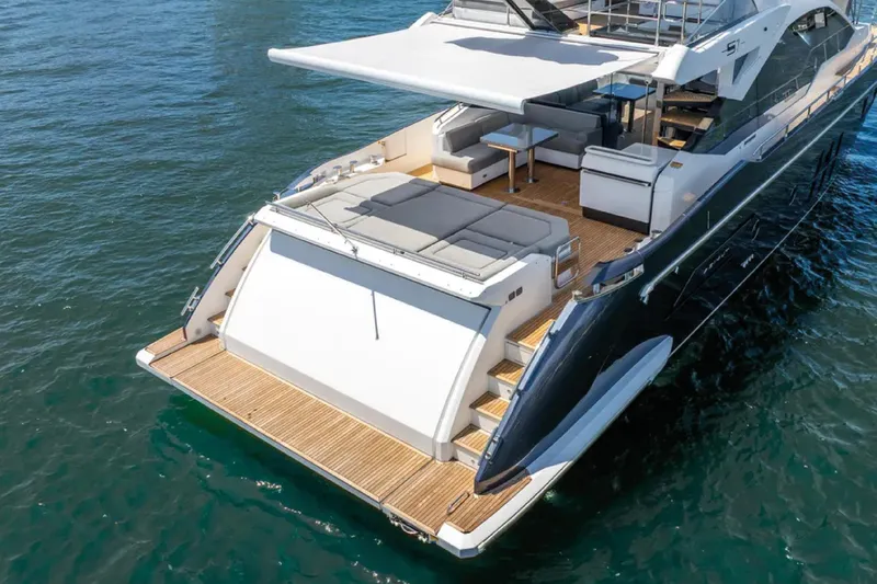 No Name Yacht Photos Pics Luxurious 2019 Azimut S7 yacht with spacious deck and modern seating on the water.