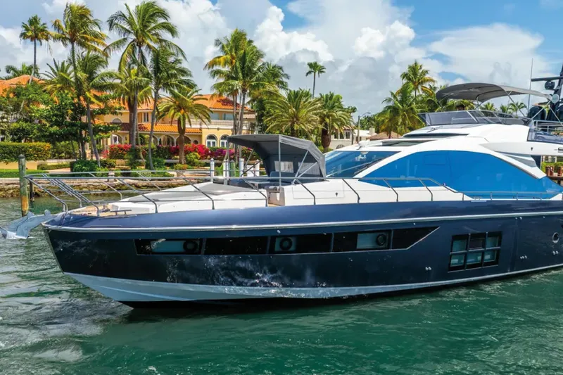 No Name Yacht Photos Pics Luxurious 2019 Azimut S7 yacht docked near tropical waterfront estate.