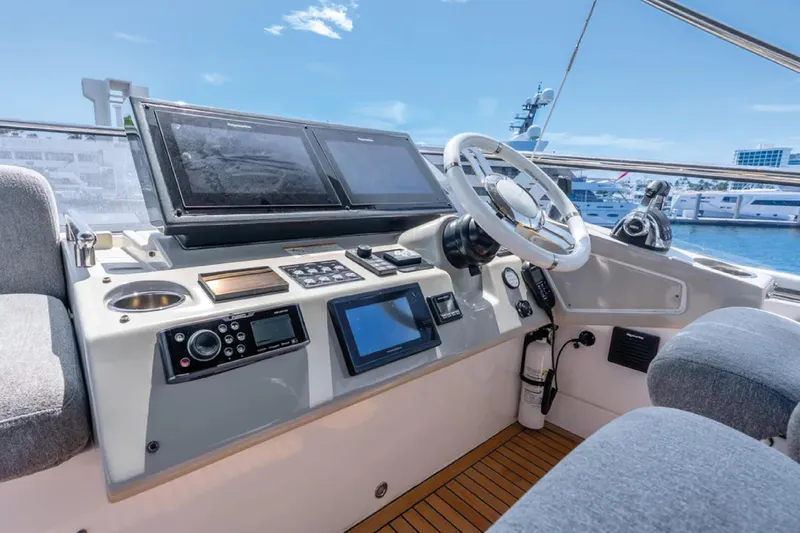 No Name Yacht Photos Pics Cockpit of 2019 Azimut S7 yacht with modern navigation equipment and steering wheel.