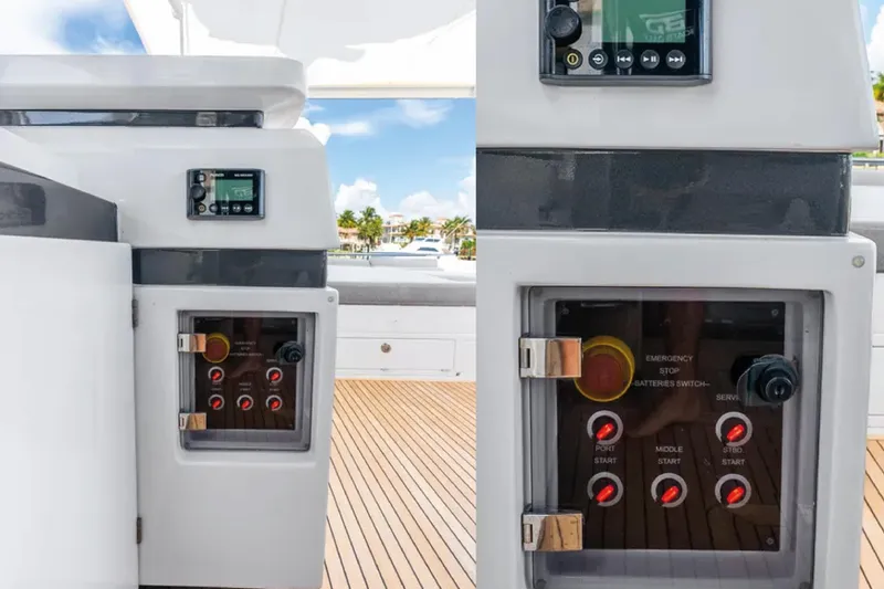 No Name Yacht Photos Pics Control panel on 2019 Azimut S7 yacht, featuring emergency stop and battery switches.